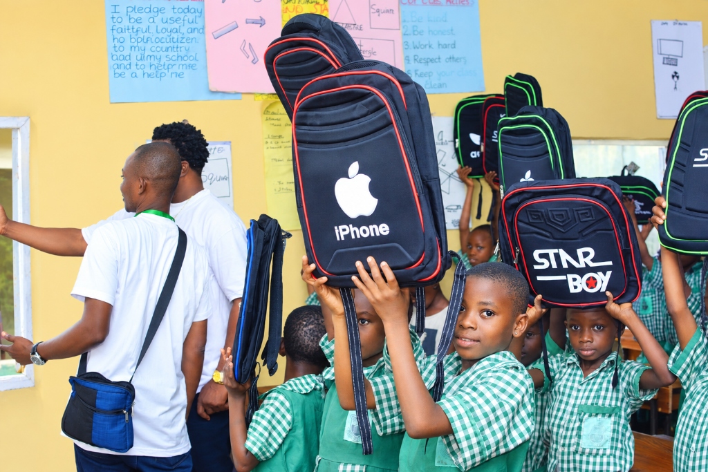 Students Celebrating with New Backpacks